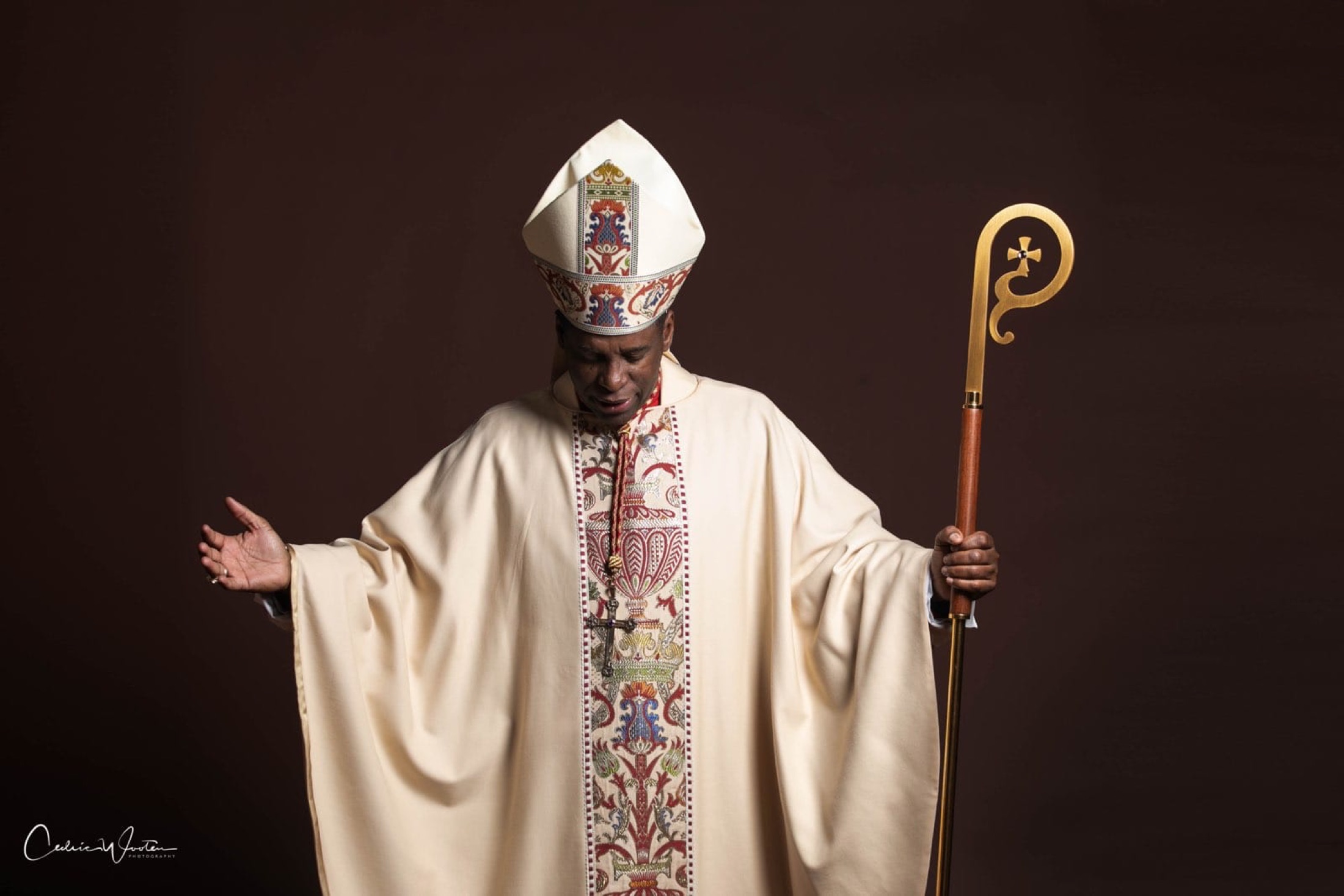 Bishop H. Curtis Douglas in episcopal vestments, mitre and crozier